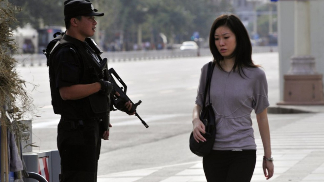 Pemerintah China mengklaim negara mereka mampu menekan angka kriminalitas.-Getty Images