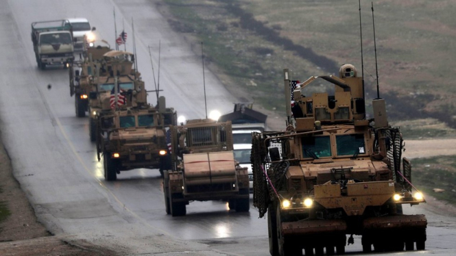Presiden AS Donald Trump mengumumkan penarikan mundur pasukan AS dari Suriah, bulan lalu.-AFP