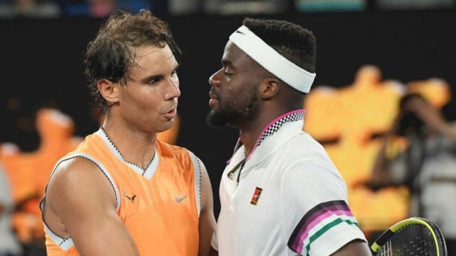 Rafael Nadal mengalahkan Frances Tiafoe di Australian Open di Melbourne. 