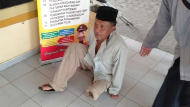 Saidi, orang tua tersangka penghina Jokowi.