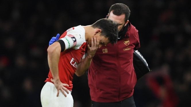 Bek Arsenal, Laurent Koscielny cedera rahang saat melawan Manchester United