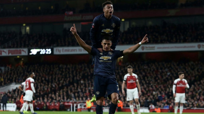 Selebrasi pemain Manchester United, Alexis Sanchez usai bobol gawang Arsenal