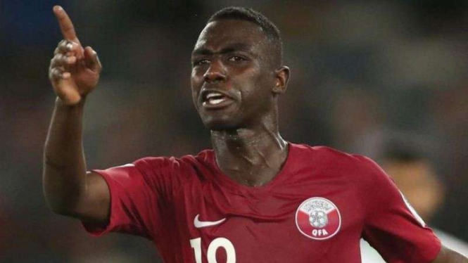 Pemain Timnas Qatar di Piala Asia 2019, Almouz Ali, melakukan selebrasi