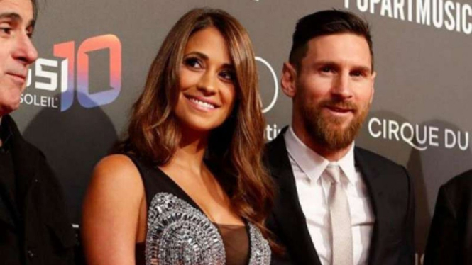 Lionel Messi dan istrinya Antonella Roccuzzo.