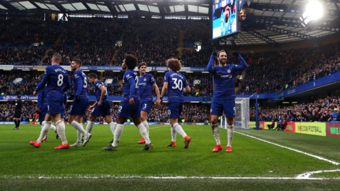 Pemain Chelsea merayakan gol.