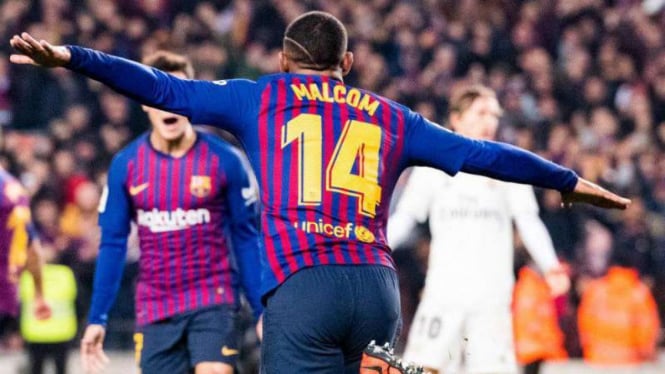 Pemain Barcelona, Malcom rayakan gol ke gawang Real Madrid.