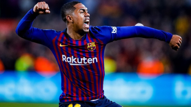 Pemain Barcelona, Malcom melakukan selebrasi usai jebol gawang Real Madrid