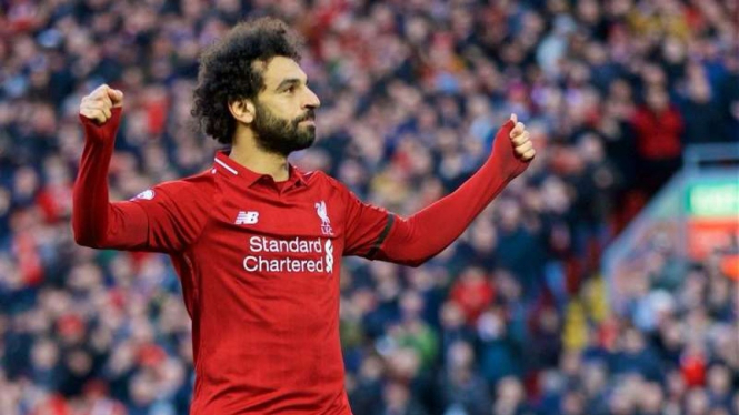 Winger Liverpool, Mohamed Salah, melakukan selebrasi usai mencetak gol