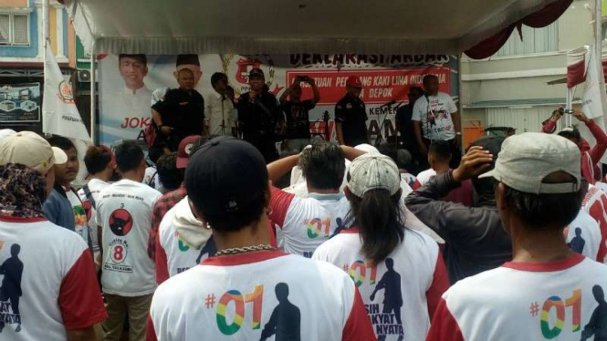 Sejumlah pedagang yang tergabung dalam PPKLI Kota Depok menggelar deklarasi mendukung pasangan Joko Widodo-Ma’ruf Amin pada Sabtu, 23 Februari 2019.