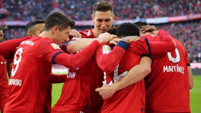 Pemain Bayern Munich merayakan gol ke gawag Hertha Berlin