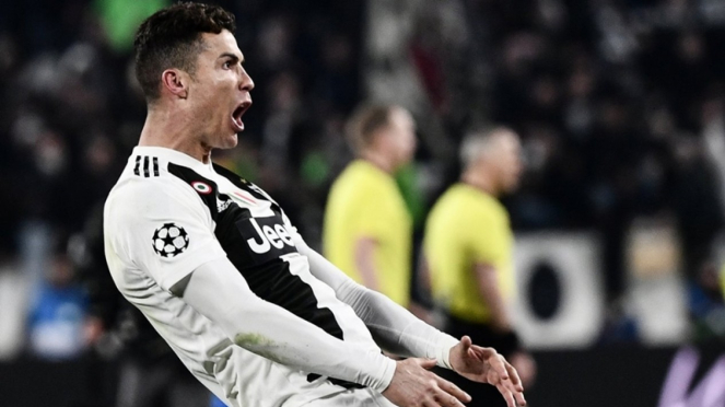 Cristiano Ronaldo merayakan kemenangan Juventus atas Atletico Madrid