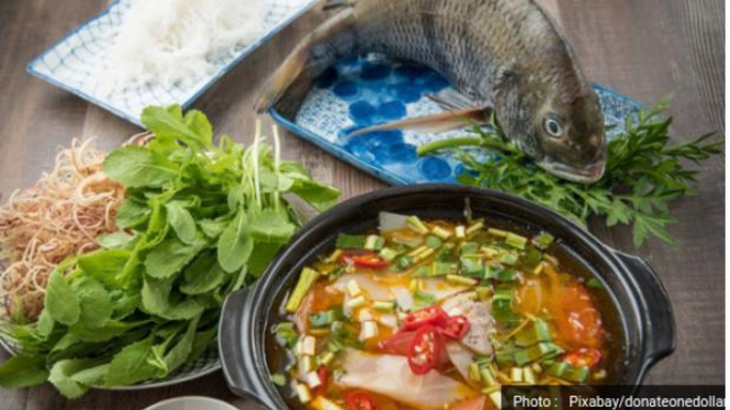 Ilustrasi kuliner Asia/olahan ikan/memasak ikan.