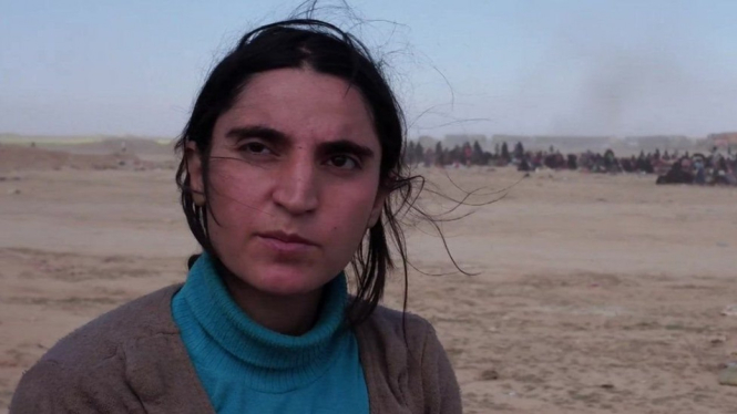Perempuan Yazidi, Adiba, mengatakan ia dipaksa menjadi budak seks sejak milisi-milisi ISIS menyerang desa kecilnya di Sinjar, Irak utara, pada 2014. - BBC