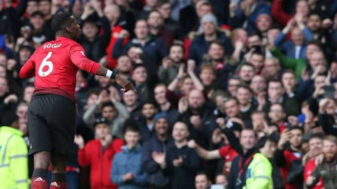 Gelandang Manchester United, Paul Pogba rayakan gol.
