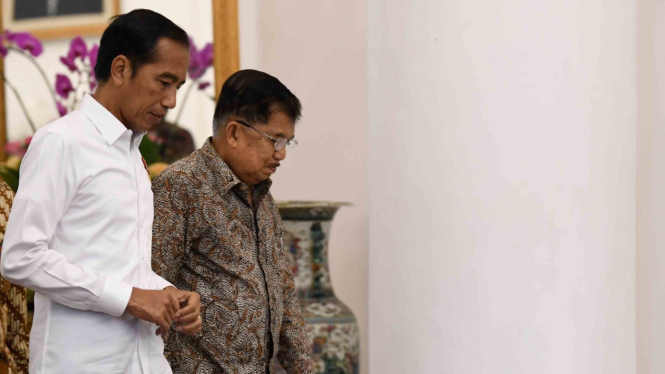 Presiden Joko Widodo (kiri) dan Wakil Presiden Jusuf Kalla (kanan). 