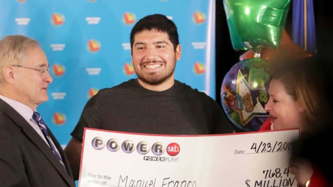 Manuel Franco of West Allis, Wisconsin, winner of second-highest Powerball lottery in history, attends a news conference at the Wisconsin Department of Revenue, on Tuesday, April 23, 2019.