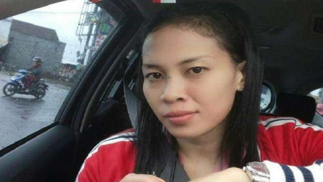 Yuny Anggareni (36), sopir Grab Car di Garut yang diminta mengantar jenazah