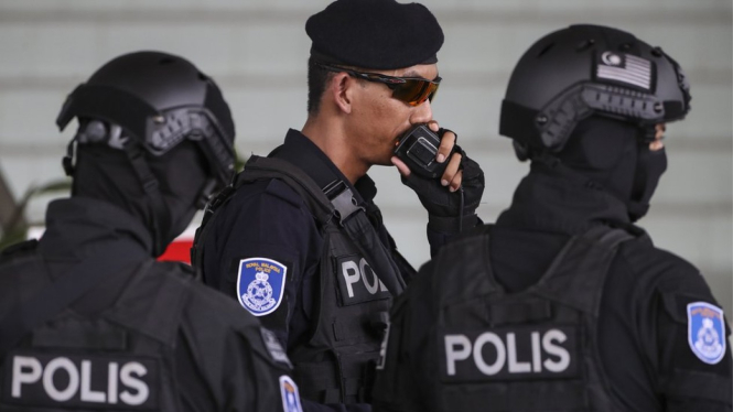 Kepolisian Malaysia masih memburu tiga orang yang disebut bagian dari kelompok "wolf pack".-FAZRY ISMAIL/EPA