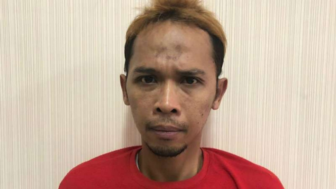 MR, tersangka setubuhi keponakan ditahan di Polrestabes Surabaya.