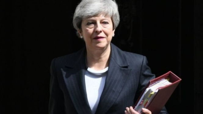 Theresa May akan tetap menjabat sebagai perdana menteri sampai ketua baru Partai Konservatif dipilih. - PA