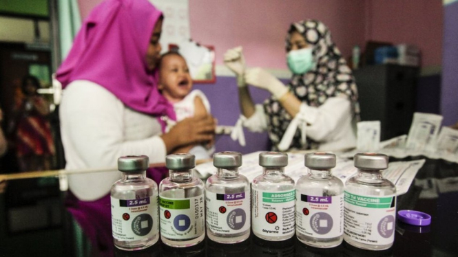 MUI Aceh sudah memperbolehkan vaksin MR, tapi sejumlah warga tetap saja berkukuh untuk tidak mengizinkan anaknya divaksin. - Getty Images