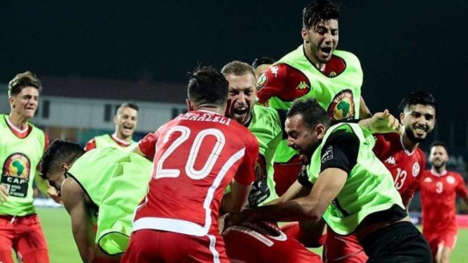 Para pemain Tunisia merayakan kemenangan atas Ghana di Piala Afrika 2019