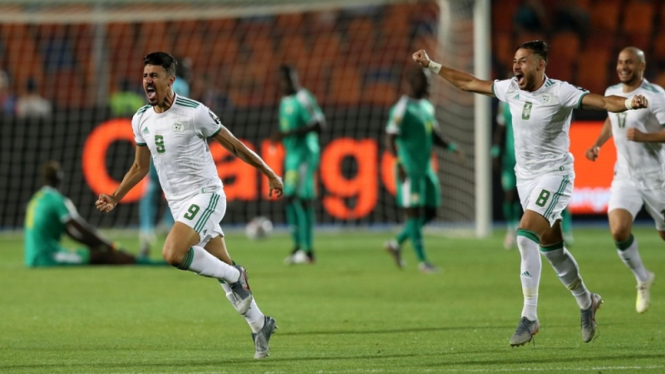Pemain Timnas Aljazair melakukan selebrasi gol ke gawang Senegal