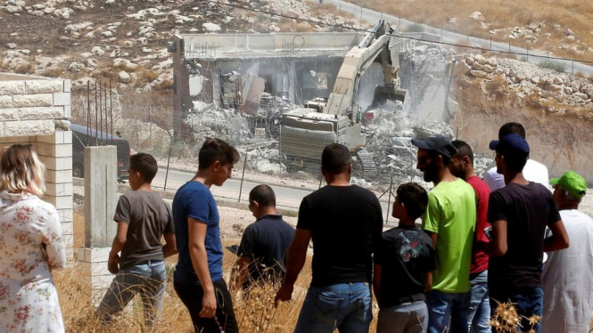 Warga mengatakan mereka mendapatkan izin membangun dari Otorita Palestina. - AFP
