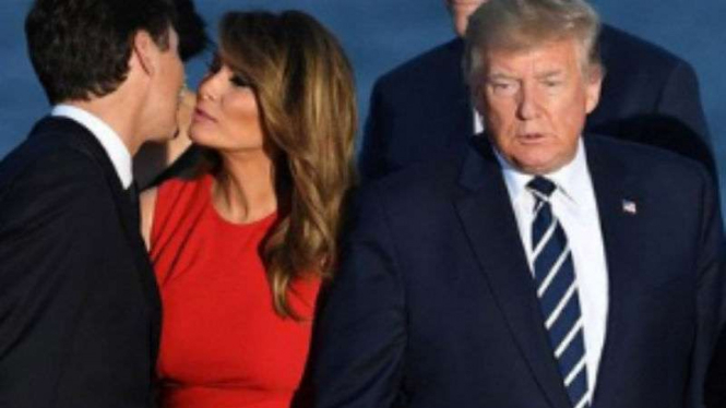 Melania Trump berbincang dengan PM Kanada, Justin Trudeau.