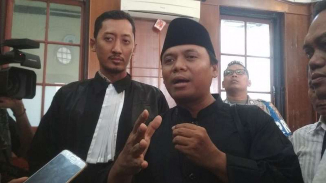 Terdakwa Sugi Nur Raharja di PN Surabaya Jawa Timur.