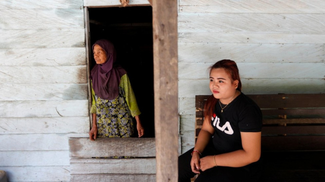 Penajam Paser Utara dihuni komunitas Dayak Paser, transmigran asal Jawa Tengah, dan para pekerja perkebunan sawit. - REUTERS/Willy Kurniawan