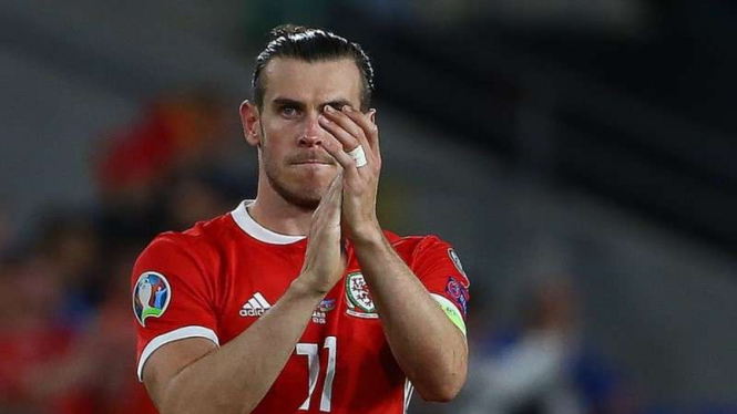 Kapten Timnas Wales, Gareth Bale, melakukan selebrasi usai mencetak gol