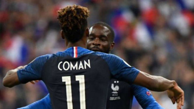 Pemain Prancis, Kingsley Coman rayakan gol.