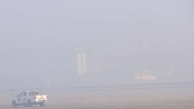 Kabut asap membuat jarak pandang terganggu. (Foto ilustrasi)