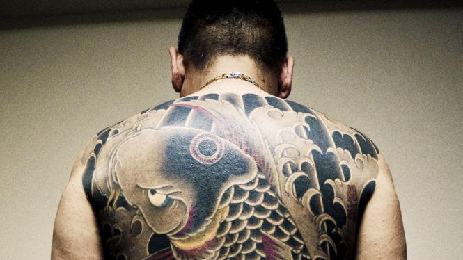 Di Jepang, tato dikaitkan dengan geng bandit yakuza yang telah beroperasi di selama ratusan tahun. - anton kusters