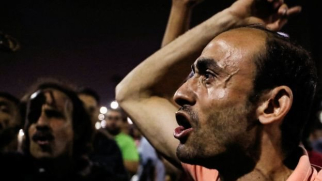 Pengunjuk rasa menuntut pengunduran diri Presiden Sisi di Kairo pada hari Jumat (20/09).-(Reuters)