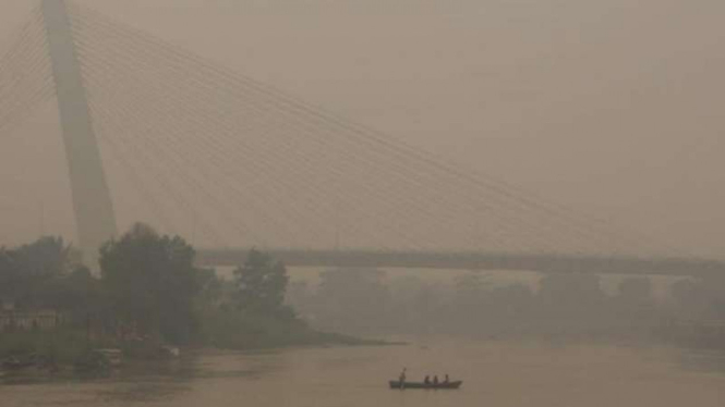 Kabut asap di Riau.