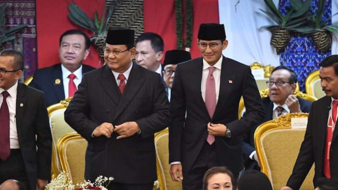 Prabowo Subianto dan Sandiaga Uno di acara pelantikan Jokowi-Maruf