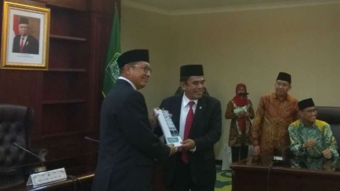Lukman Hakim Saifuddin dan Menteri Agama baru, Fachrul Razi. 