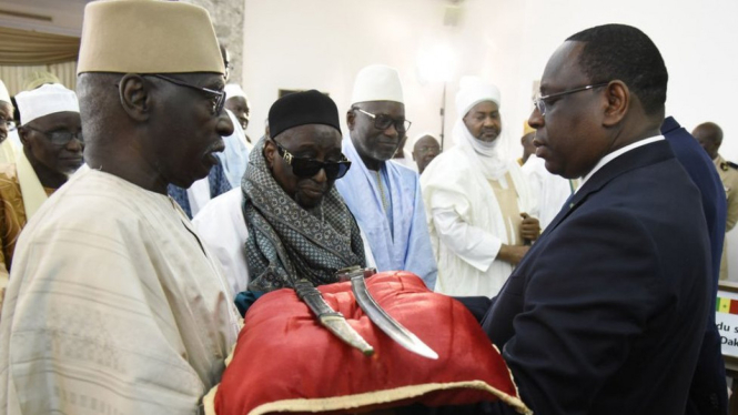 Senegal`s President Macky Sall (R) called it an historic day" - AFP"