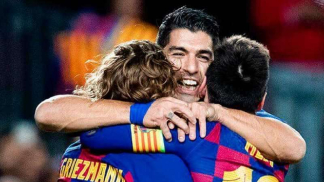 Trio penyerang Barcelona, Lionel Messi, Luis Suarez, dan Antoine Griezmann