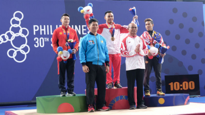 Lifter Indonesia, Eko Yuli Irawan, sabet emas di SEA Games 2019.