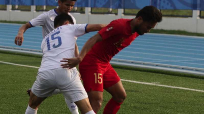 Timnas menghadapi Laos di babak penyisihan Grup B