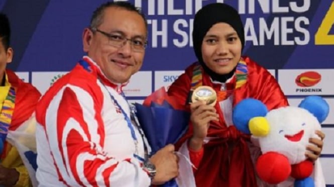 Atlet Pencak Silat Indonesia Suci Wulandari raih medali emas SEA Games 2019 di Manila. 