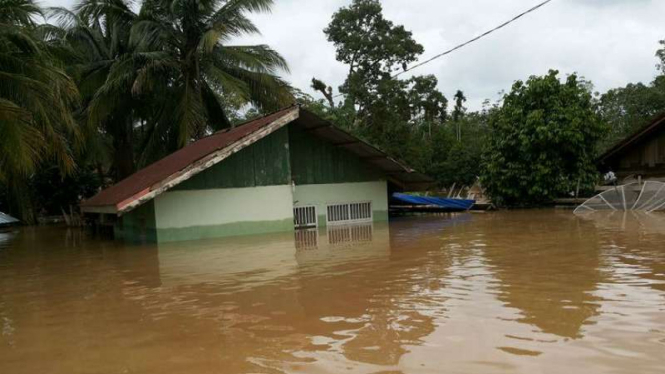 Banjir di Jambi akibat meluapnya sungai Tebo di Jambi.