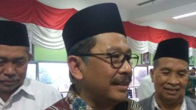 Wakil Ketua Umum MUI Zainut Tauhid Sa'adi (tengah)