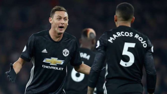 Dua pemain Mancheser United, Nemanja Matic dan Marcos Rojo