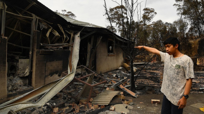 Rumah tempat Gabriel dan keluarganya tinggal telah hancur akibat kebakaran hutan di negara bagian New South Wales, Australia. - The Sydney Morning Herald