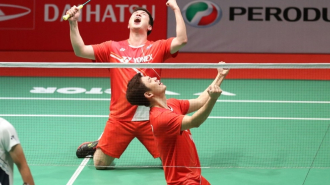 Ganda putra Korea Selatan, Lee Yong-dae/Kim Gi-jung di Malaysia Masters