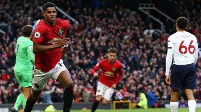 Penyerang Manchester United, Marcus Rashford, melakukan selebrasi